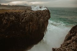 edge of cliff near water