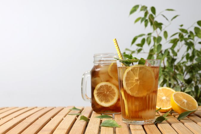 Cold tea with fresh oranges and mint leaves