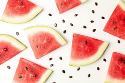 Composition with fresh watermelon slices on blank background, top view