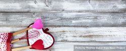 Valentine’s day with cooking utensils on aged wood 0V2kG0