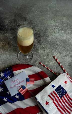American themed flag plates and beer for July 4th celebration