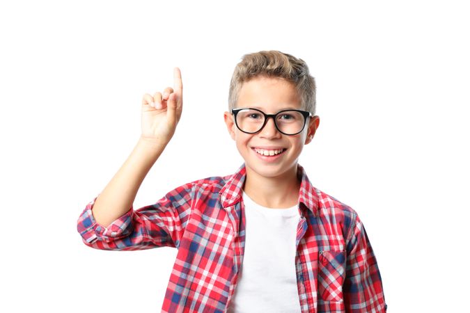 Boy in glasses and shirt isolated on blank background