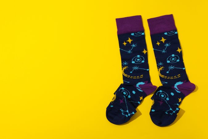 Concept of clothes for legs - socks, space for text