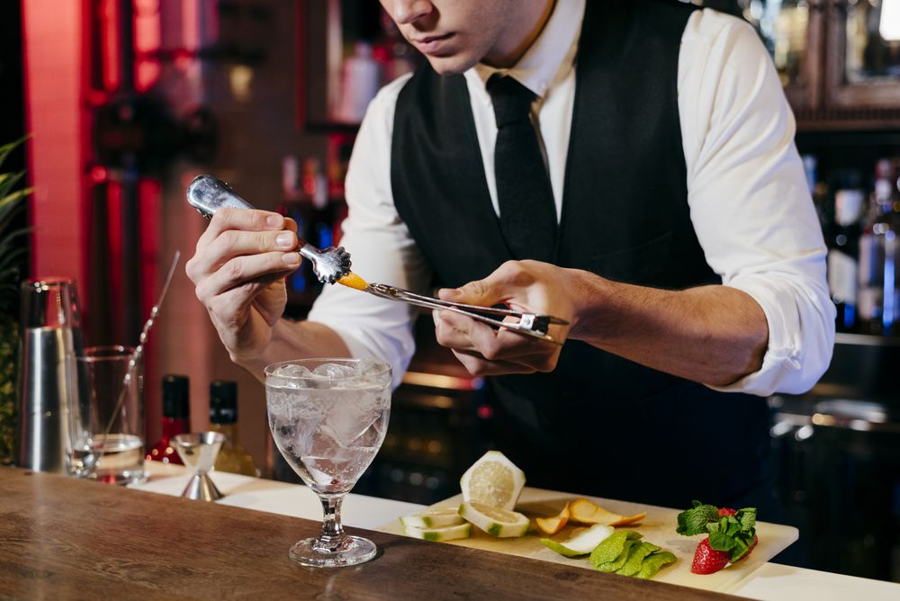 Barman working making drinks