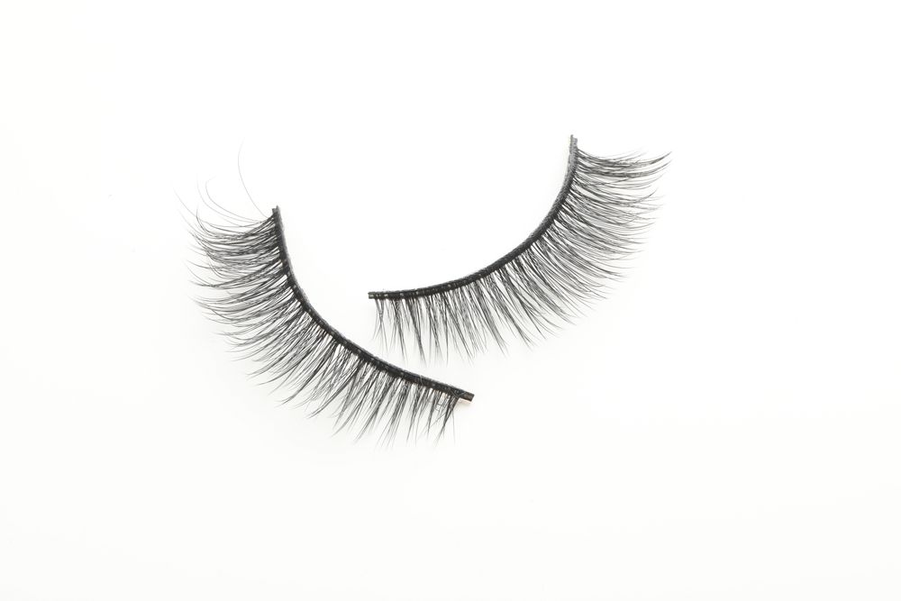 false eyelashes, isolated on light background
