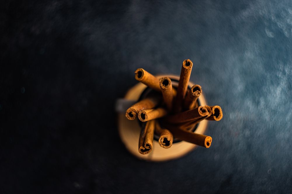 Top view of cinnamon sticks in container