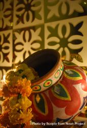 Saffron flowers in a colorful pottery 4mwQW0
