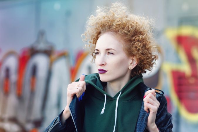 Street fashion with curly haired woman