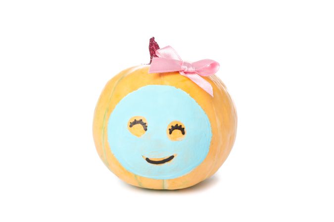 Pumpkin with facial mask and bow