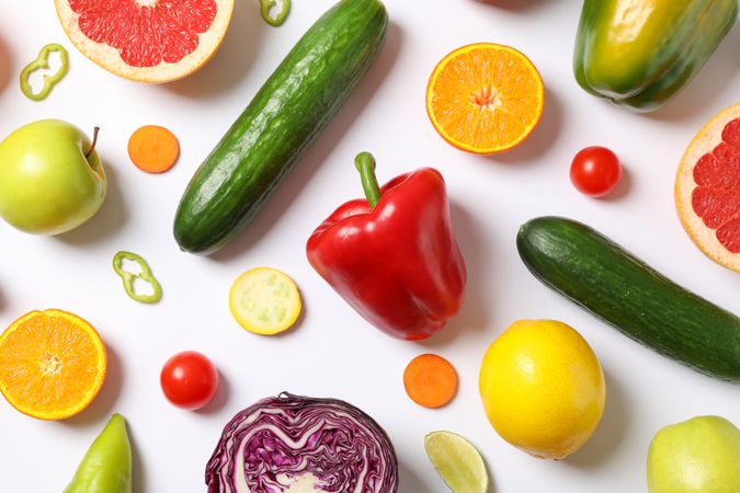 Different vegetables and fruits on plain background, top view