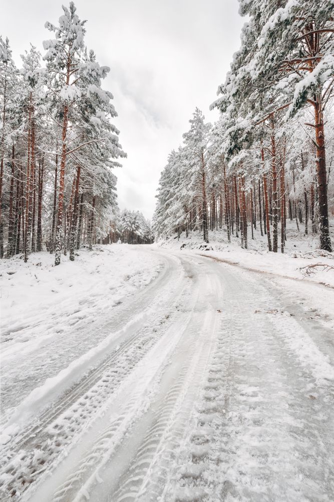 Winter snowy empty country road