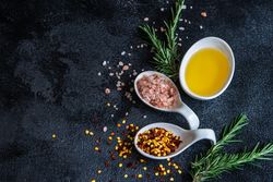 Spice cooking concept with chili, salt and oil