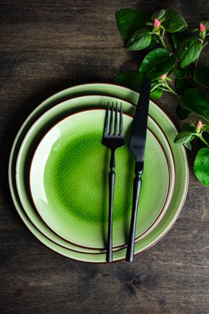 Spring table setting of green plates