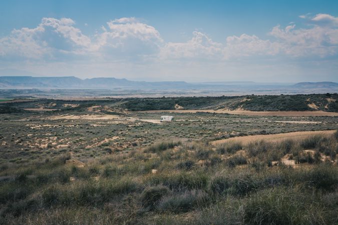 trailer on empty road along desert