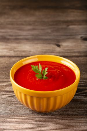 Delicious homemade tomato soup in bowl.