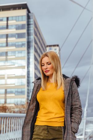 Blonde woman walking in the city