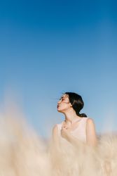 Woman standing in field