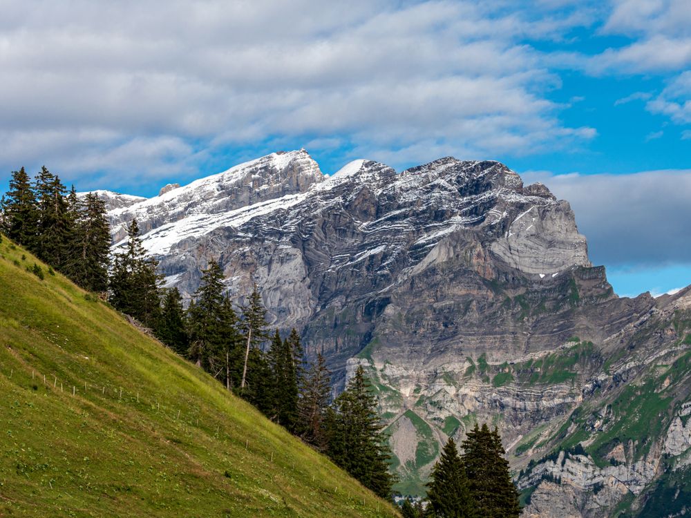 Summer travel to the Swiss Alps. Sun, warm beautiful weather, relaxation and travel.