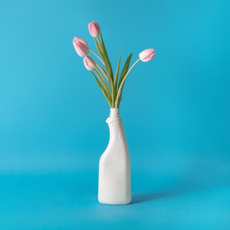 Cleaning spray bottle with tulips