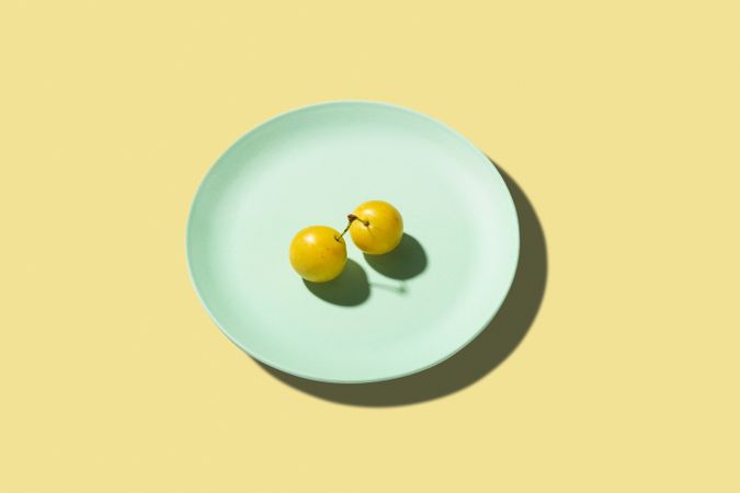 Fresh Yellow plum mirabelle fruit in plate