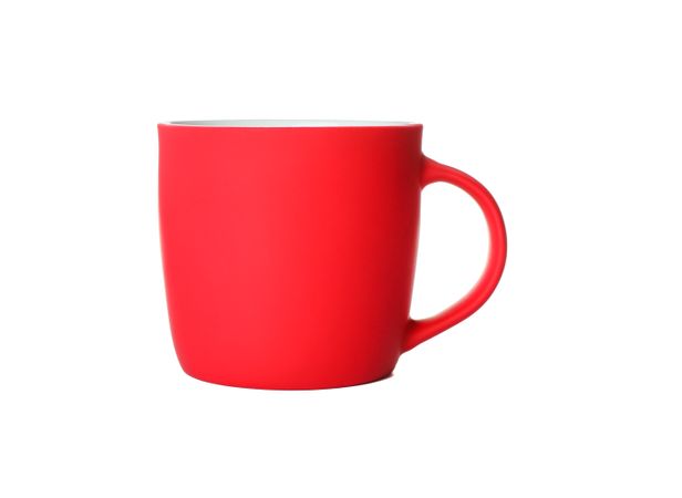 Empty ceramic cup isolated on studio background