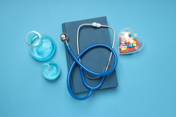 Concept of medical education and books, top view