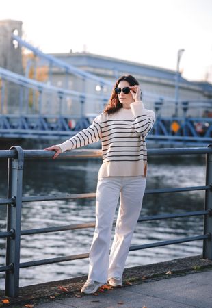Woman enjoying view  from the waterfront