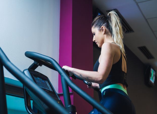 woman on exercise machine