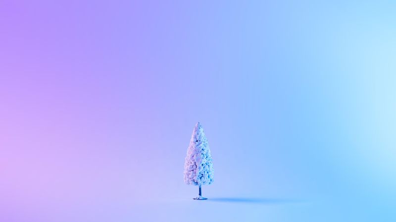 Snowy Christmas tree in vibrant bold gradient holographic colors