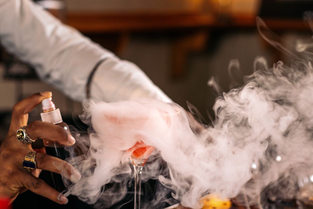 The magic of mix: a bartender preparing his best creations