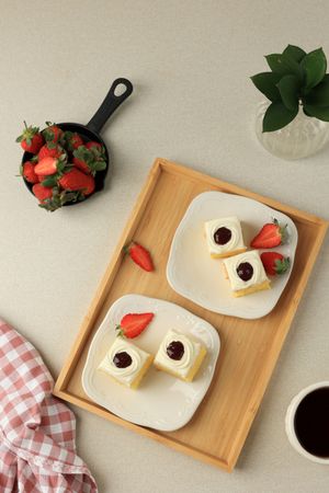 Top View Slice Sponge Cake with Cream and Strawberry Jam
