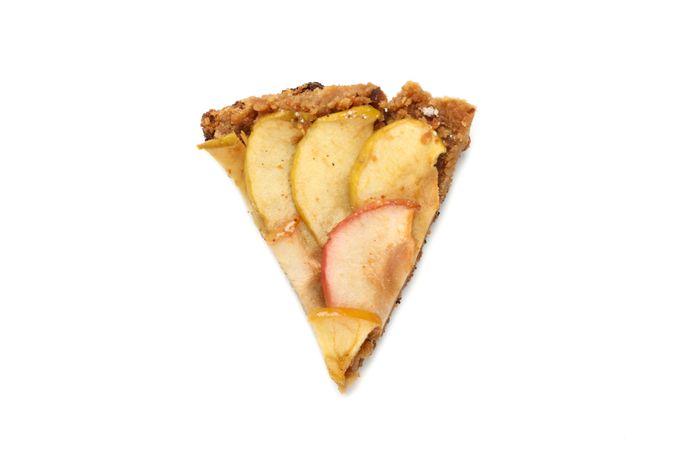 Piece of tasty apple pie isolated on neutral background. Homemade food