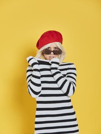 Happy young female in red beret