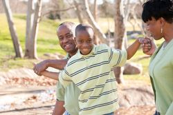 Happy Black Man, Woman and Child