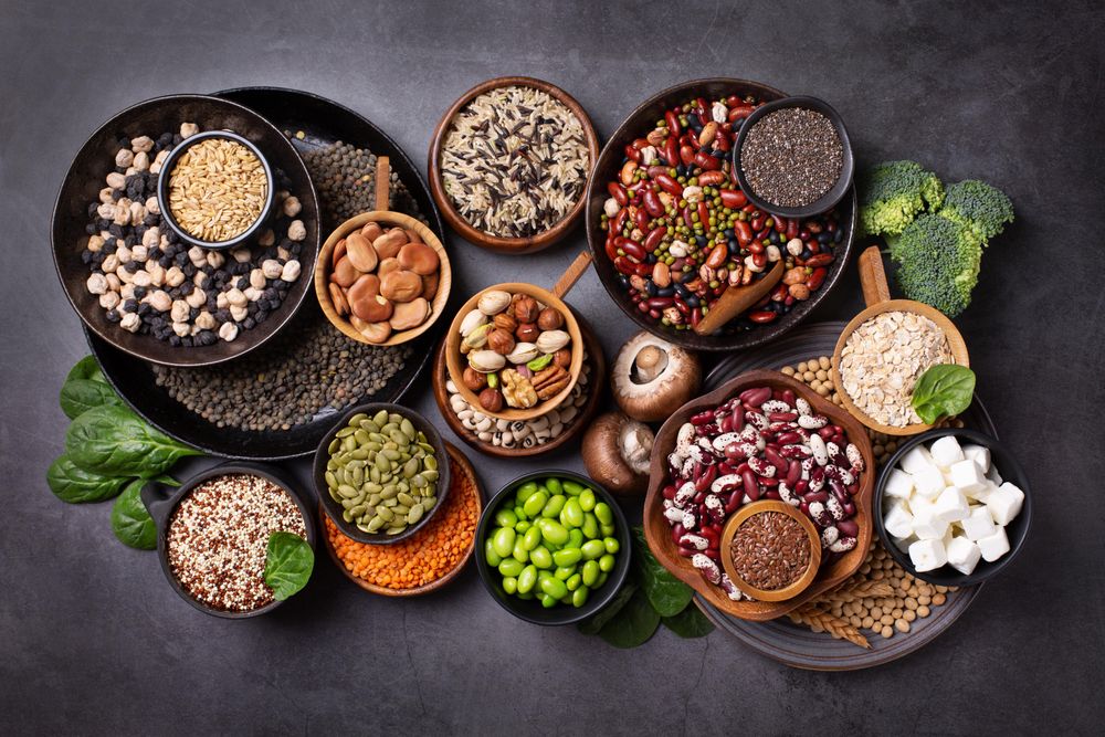 Bowls of healthy grains and vegetables, top view