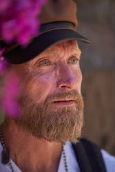 Bearded mature man in cap