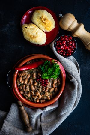 Top view of Georgian bean dish with pomegranates 