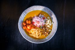 Delicious authentic dish served in bowl on surface
