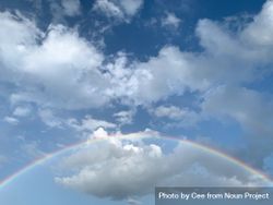 Full rainbow with clouds bx8GZb