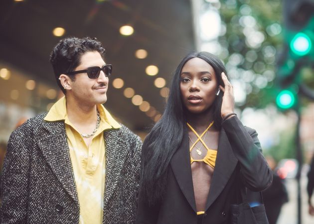 London, England, United Kingdom - September 18 2021: Black woman and white man at fashion week