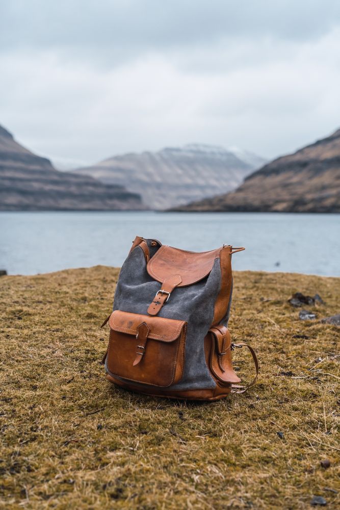 Briefcase on shore lake
