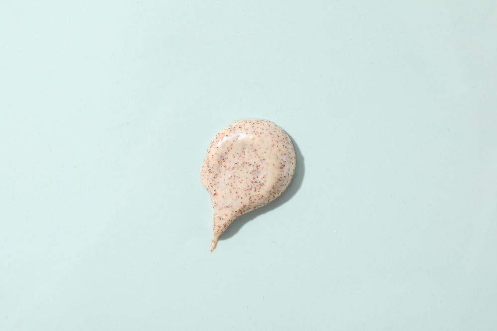 Scrub on light blue background, top view