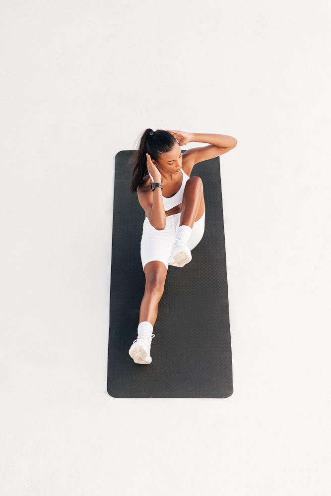 High angle of a fit woman doing abs exercises