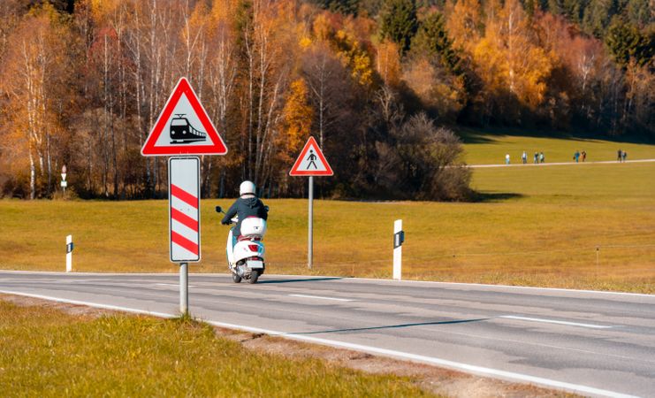 Autumn landscape with a road on a sunny day in bavarian alps