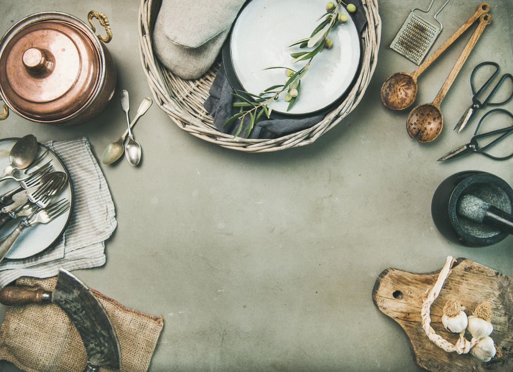 Kitchen appliances with a vintage look on concrete background, with copy space