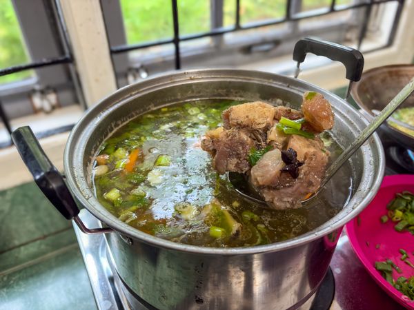 Indonesian Beef Soup Cooking in Pot on Stove