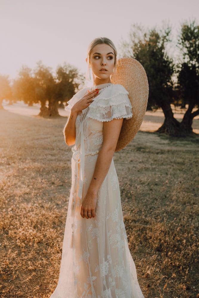 Woman in dress posing on nature