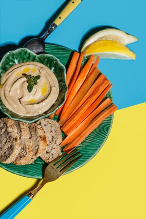 Tasty healthy snack of carrot with bread and sauce