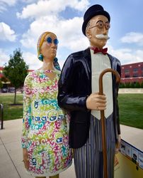 Figures, roughly modeled after artist Grant Wood's "American Gothic" figures, Cedar Rapids, Iowa V5k8W4