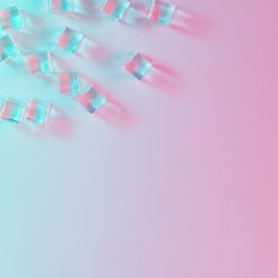 Ice cubes in vibrant bold gradient holographic colors